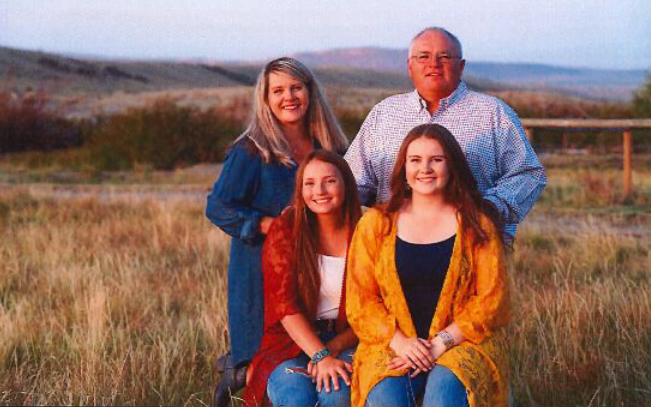 Scott and Pam Thayer, with their daughters Sydney and Darby